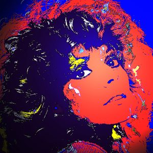 Young woman head and shoulder bold oranges blue and bright yellow retro 80’s style pop star