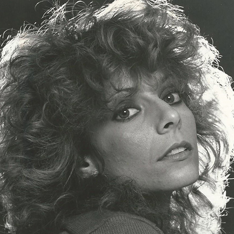 Black and white photograph of young woman head and shoulder